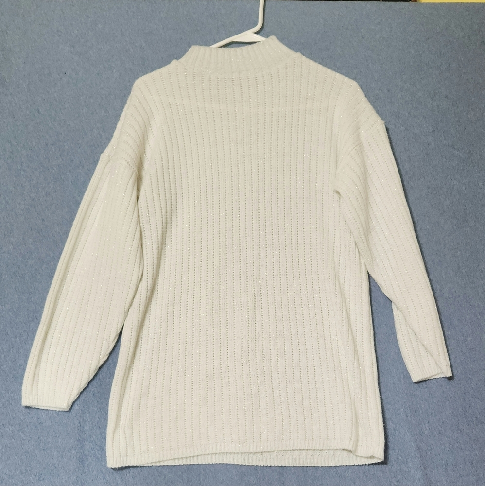 American Pride white shimmery turtle neck sweater. Size medium
